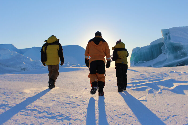 3 people in Antarctica that illustrates do people live in Antarctica
