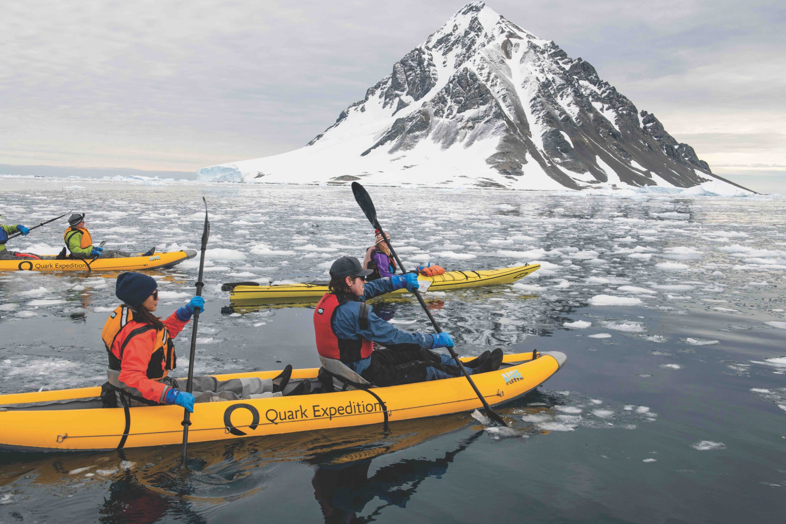 Antarctica, below the Antarctic Circle. Marguerite Bay. Paddle boats kayaks in Marguerite Bay