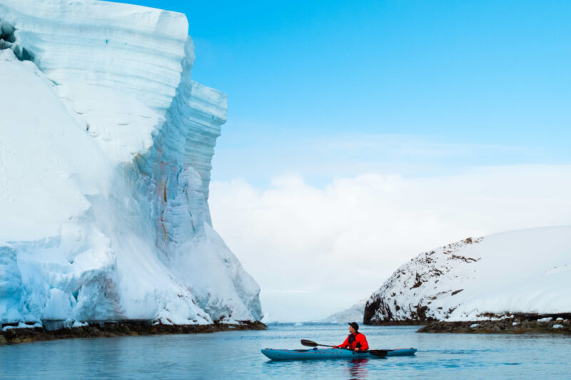 Guest on kayak in Antarctica
