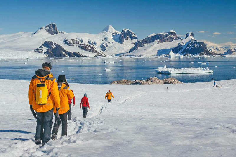 Guests hiking in Antarctica