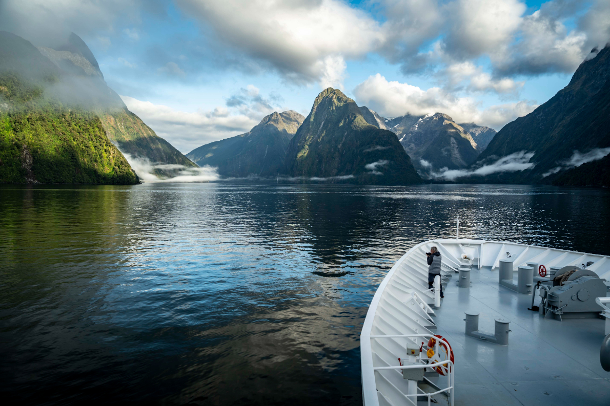 Heritage-New Zealand-2 Fjordlands ship with guests on bow