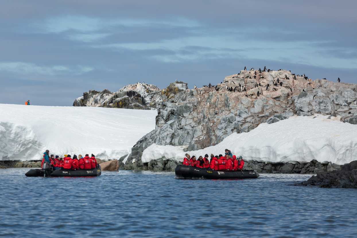 Poseidon-Antarctica-00002 guests on zodiacs in Antarctica