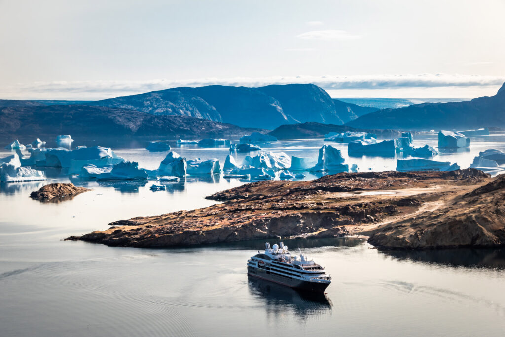 a cruise ship in the Arctic during the summer