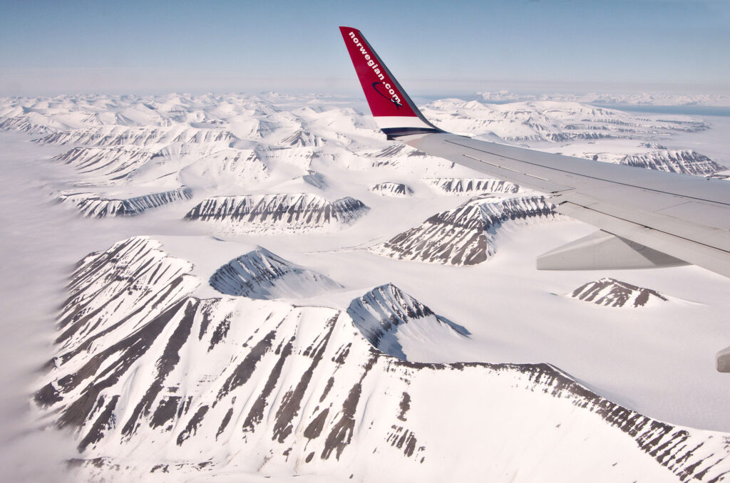 view from the plane window flying over Svalbard